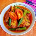 Cooksnap Norashikin Rahmat semasa beliau membuat Masak asam pedas kepala ikan jenahak.