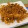 Cooksnap Kanaaneko semasa beliau membuat Crispy Enoki.