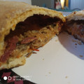 El cooksnap de Helena Ortiz cuando hizo Pizza calzone de salami con champiñones.