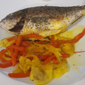 El cooksnap de Esther Pérez cuando hizo Dorada al horno con pimientos y cebolla.