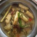 Cooksnap Ain Mohd Kitchen semasa beliau membuat Asam rebus batang keladi.