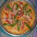 Bhavya food and snacks vlog का कुकस्नैप जब उन्होंने कॉर्न पिज़्ज़ा (corn pizza recipe in Hindi) बनाया था।