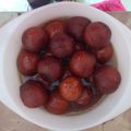 Alifya_Hussein's cooksnap of when they made Sobzee's indian Gulab jamun (doughnut like balls soaked in syrup.