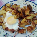 El cooksnap de Nicoleta Denisa Popescu cuando hizo Papas huevos y bacon.
