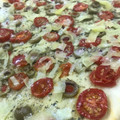El cooksnap de carlos cuando hizo Focaccia de tomate cherry, olivas negras y romero.