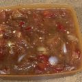 Cooksnap reina semasa beliau membuat Air Asam Kerisik.