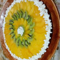 El cooksnap de carina_garcia cuando hizo Tarta de durazno y kiwi con crema pastelera.