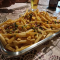 El cooksnap de Rodri Giraudo cuando hizo Papas fritas con salsa de cheddar, panceta y cebolla de verdeo.