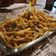 El cooksnap de Rodri Giraudo cuando hizo Papas fritas con salsa de cheddar, panceta y cebolla de verdeo.