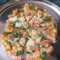 Kirti Mathur का कुकस्नैप जब उन्होंने टोमाटो कैप्सिकम पिज़्ज़ा (tomato capsicum pizza recipe in Hindi) बनाया था।