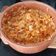 El cooksnap de gallegovaz cuando hizo Mariscos en salsa de tomate con arroz en olla de barro.