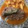 El cooksnap de Fatima Garcia cuando hizo Bistec de puerco con cebolla y papas en salsa de jitomate.