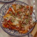 صورة من نوتي الكيوتي، شاركها بعد تجربة وصفة ميني بيتزا 🍕