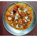 Arpita mukherjee's cooksnap of when they made চিকেন পিজ্জা (Chicken pizza recipe in Bengali).