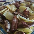El cooksnap de sualja cuando hizo Costillas de cerdo con patatas al horno.