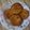 Haniya Khan's cooksnap of when they made Meethi Tikiya with crackers.