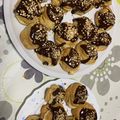 El cooksnap de tapese cuando hizo Corona de pasta choux rellena de crema pastelera y chocolate. Especial navidad.