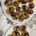 El cooksnap de tapese cuando hizo Corona de pasta choux rellena de crema pastelera y chocolate. Especial navidad.