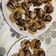 El cooksnap de tapese cuando hizo Corona de pasta choux rellena de crema pastelera y chocolate. Especial navidad.