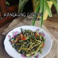 Cooksnap Hani Shaimi semasa beliau membuat Kangkung Goreng Pedas.