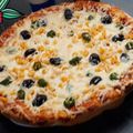 صورة من وصفات أم أنس، شاركها بعد تجربة وصفة بيتزا مشكل 🍕🍕