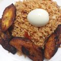 Jane Fash 's cooksnap of when they made Jollof rice with cooked beef and fried plaintain.