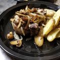 tlacuache's cooksnap of when they made Cast Iron Pork Chops with Onions & Mushrooms.