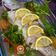 Cooksnap Zieta Ali semasa beliau membuat Siakap stim lemon.