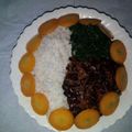 Jesse's cooksnap of when they made Rice with Black beans (Njahi).