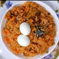 Zarah Modibbo's cooksnap of when they made Jollof rice with boiled egg.