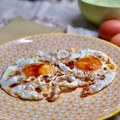 El cooksnap de Elena cuando hizo Huevos fritos con patatas, ajos enteros y pimientos de padrón.