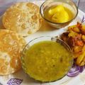 Puja Shaw's cooksnap of when they made লুচি - নারকেল দিয়ে ছোলার ডাল (Luchi - narkel diye cholar dal recipe in Bengali).