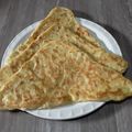 صورة من 🇩🇿🇩🇿مطبخ Houhouzin، شاركها بعد تجربة وصفة مسمن مثلثات المعسل🍯🍯 بالفرينة