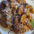 El cooksnap de brunosky32 cuando hizo Berenjenas en tempura con miel y queso mozzarella, acompañadas de patatas deluxe.