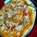 Nabiha Rizwan's cooksnap of when they made Thin Crust Seekh Kabab pizza.