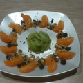 El cooksnap de Lady Marmalade cuando hizo Desayuno saludable: kiwi, mandarina, nueces, pasas y miel.