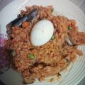 Oyinkansinuolami Victoria Bada's cooksnap of when they made Jollof Rice Recipe.
