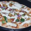 Saira Abdullah's cooksnap of when they made Tandoori Chicken pizza.