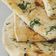 Cooksnap de ana pires quando cozinhou Naan (Pão Indiano) com manteiga de coentros.