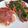 Miles's cooksnap of when they made Oven Baked Mozzarella wrapped in Parma Ham, with sautéed Onion and Tomato.