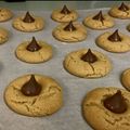 freedomhutch's cooksnap of when they made peanut butter kiss cookies.