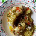 El cooksnap de Elizabeth Flores cuando hizo Filete de merluza en colchón de cebolla y pimientos .