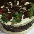 El cooksnap de Rominita cuando hizo Torta de chocolate con frutillas y crema chantillí.