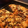 Nthabiseng Mogola (Thaso Mog) 's cooksnap of when they made Bbq Chicken and Mushroom Fire Grilled Pizza #braaifordad!.