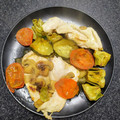 El cooksnap de Tonysantos cuando hizo Filetes de pollo con verduras en papillote.