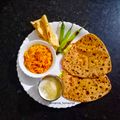 Mamta Pandya's cooksnap of when they made પરાઠા અને સેવ ટામેટા સબ્જી (Paratha Sev Tomato Sabji Recipe In Gujarati).