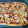 El cooksnap de Encar cuando hizo Pizza con bacon y cebolla frita al orégano.