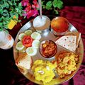 Mamta Jain का कुकस्नैप जब उन्होंने पारम्परिक जैन राजस्थानी थाली - सरप्राइज दाल-बाटी, चुरमा, राम खिचड़ी, गट्टे की सब्जी बनाया था।