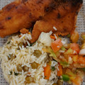 El cooksnap de Martha Aracely Nuñez cuando hizo Pescado frito al orégano. Con arroz con zanahoria y vainitas.