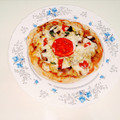 کوک اسنپ راضیه گرگانی بعد از امتحان کردن پیتزا مرغ و قارچ.